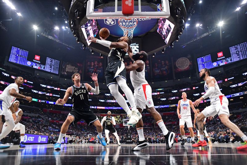 LOS ANGELES, CA - MARCH 10: Damian Lillard #0 of the Milwaukee Bucks shoots the ball during the game against the LA Clippers on March 10, 2024 at Crypto.Com Arena in Los Angeles, California. NOTE TO USER: User expressly acknowledges and agrees that, by downloading and/or using this Photograph, user is consenting to the terms and conditions of the Getty Images License Agreement. Mandatory Copyright Notice: Copyright 2024 NBAE (Photo by Adam Pantozzi/NBAE via Getty Images)