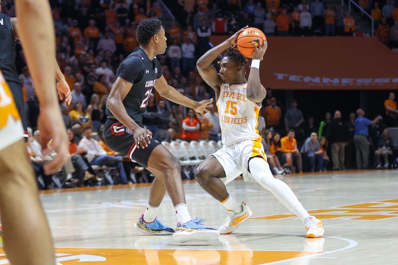 Feb 25, 2023; Knoxville, Tennessee, USA; Tennessee Volunteers guard Jahmai Mashack (15) moves the ball against South Carolina Gamecocks forward Gregory Jackson II (23) during the first half at Thompson-Boling Arena. Mandatory Credit: Randy Sartin-USA TODAY Sports