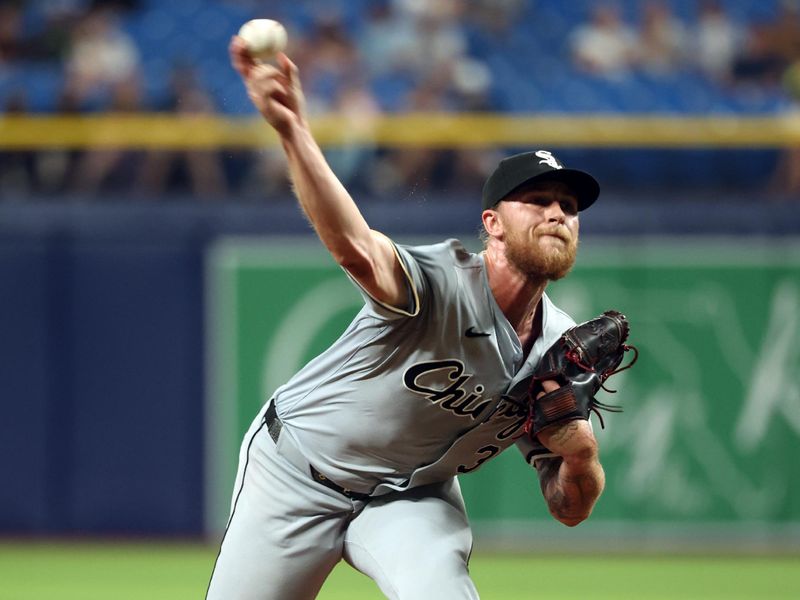 May 8, 2024; St. Petersburg, Florida, USA;  Chicago White Sox pitcher Michael Kopech (34) throws a pitch against the Tampa Bay Rays during the ninth inning at Tropicana Field. Mandatory Credit: Kim Klement Neitzel-USA TODAY Sports