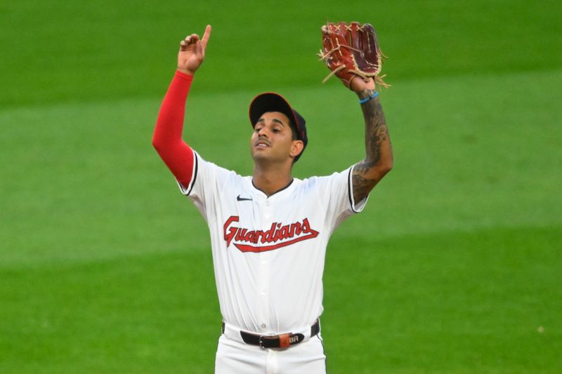 May 20, 2024; Cleveland, Ohio, USA; Cleveland Guardians shortstop Brayan Rocchio (4) celebrates after a win against the New York Mets at Progressive Field. Mandatory Credit: David Richard-USA TODAY Sports