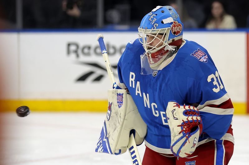 Oct 20, 2025; New York, New York, USA; New York Rangers goaltender Igor Shesterkin (31) makes a save against the Minnesota Wild during the first period at Madison Square Garden. Mandatory Credit: Brad Penner-Imagn Images