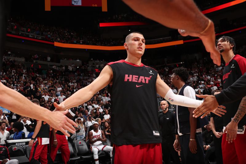 MIAMI, FL - OCTOBER 23: Tyler Herro #14 of the Miami Heat is introduced before the game against the Orlando Magic on October 23, 2024 at Kaseya Center in Miami, Florida. NOTE TO USER: User expressly acknowledges and agrees that, by downloading and or using this Photograph, user is consenting to the terms and conditions of the Getty Images License Agreement. Mandatory Copyright Notice: Copyright 2024 NBAE (Photo by Issac Baldizon/NBAE via Getty Images)