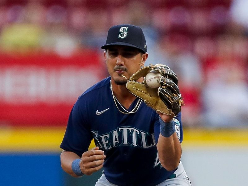 Sep 5, 2023; Cincinnati, Ohio, USA; Seattle Mariners second baseman Josh Rojas (4) tags second to get Cincinnati Reds designated hitter Jake Fraley (not pictured) out in the first inning at Great American Ball Park. Mandatory Credit: Katie Stratman-USA TODAY Sports