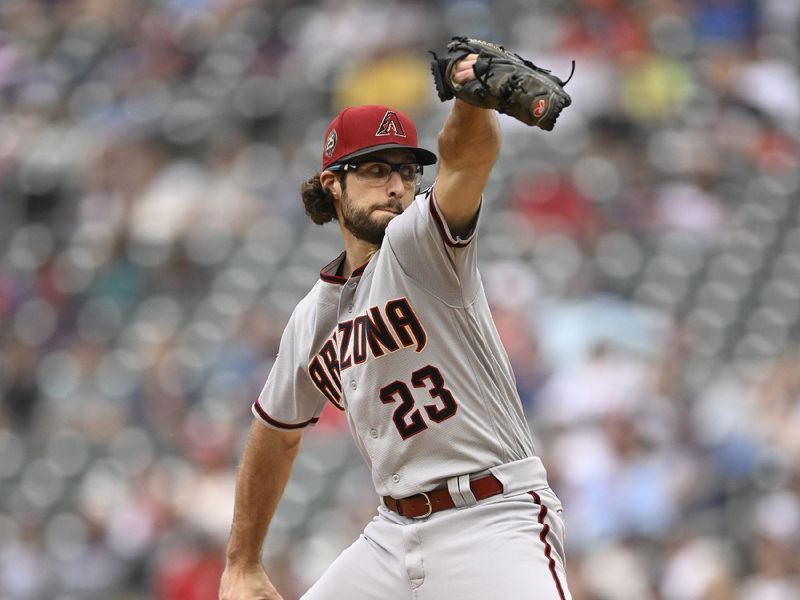 Aug 6, 2023; Minneapolis, Minnesota, USA; Arizona Diamondbacks pitcher Zac Gallen (23) delivers a pitch against the Minnesota Twins during the second inning at Target Field. Mandatory Credit: Nick Wosika-USA TODAY Sports