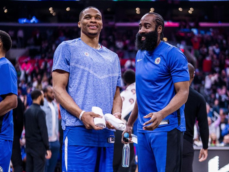 LOS ANGELES, CA - APRIL 12: Russell Westbrook #0 and James Harden #1 of the LA Clippers smile after the game against the Utah Jazz on April 12, 2024 at Crypto.Com Arena in Los Angeles, California. NOTE TO USER: User expressly acknowledges and agrees that, by downloading and/or using this Photograph, user is consenting to the terms and conditions of the Getty Images License Agreement. Mandatory Copyright Notice: Copyright 2024 NBAE (Photo by Tyler Ross/NBAE via Getty Images)