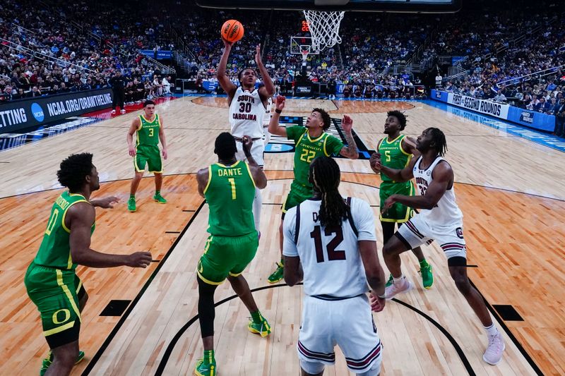 Mar 21, 2024; Pittsburgh, PA, USA; South Carolina Gamecocks forward Collin Murray-Boyles (30) shoots the ball in the first round of the 2024 NCAA Tournament at PPG Paints Arena. Mandatory Credit: Gregory Fisher-USA TODAY Sports