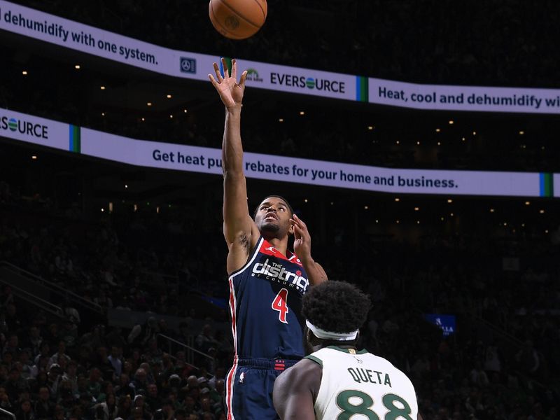 BOSTON, MA - APRIL 14: Jared Butler #4 of the Washington Wizards drives to the basket during the game against the Boston Celtics on April 14, 2024 at the TD Garden in Boston, Massachusetts. NOTE TO USER: User expressly acknowledges and agrees that, by downloading and or using this photograph, User is consenting to the terms and conditions of the Getty Images License Agreement. Mandatory Copyright Notice: Copyright 2024 NBAE  (Photo by Brian Babineau/NBAE via Getty Images)