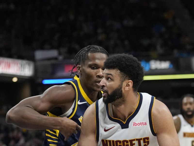 INDIANAPOLIS, IN - JANUARY 23: Jamal Murray #27 of the Denver Nuggets drives to the basket during the game against the Indiana Pacers on January 23, 2024 at Gainbridge Fieldhouse in Indianapolis, Indiana. NOTE TO USER: User expressly acknowledges and agrees that, by downloading and or using this Photograph, user is consenting to the terms and conditions of the Getty Images License Agreement. Mandatory Copyright Notice: Copyright 2024 NBAE (Photo by AJ Mast/NBAE via Getty Images)