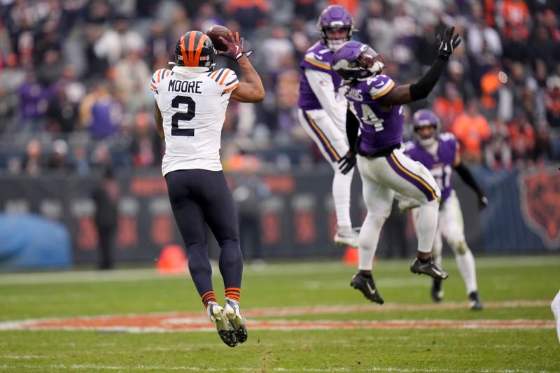 Chicago Bears wide receiver DJ Moore (2) makes a catch during the second half of an NFL football game against the Minnesota Vikings, Sunday, Nov. 24, 2024, in Chicago. (AP Photo/Erin Hooley)