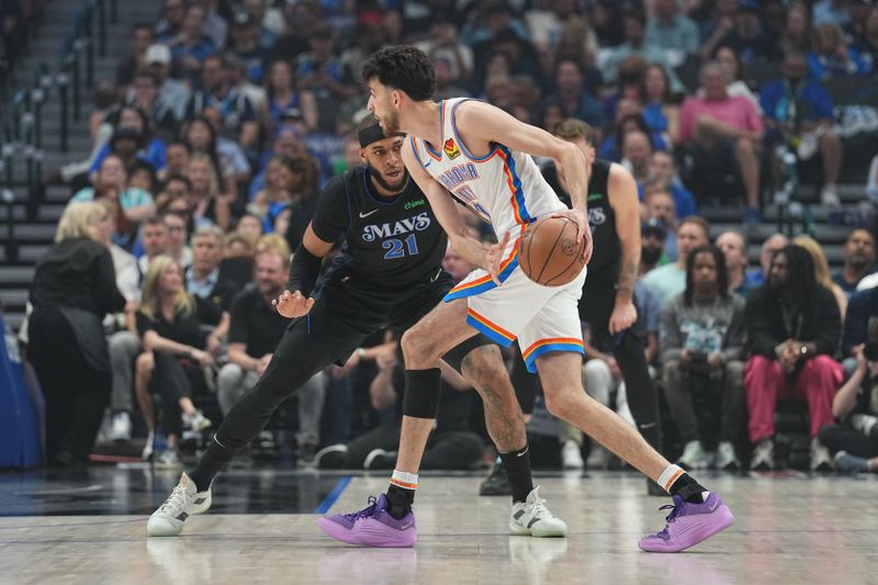 DALLAS, TX - MAY 18:  Daniel Gafford #21 of the Dallas Mavericks plays defense during the game  against Chet Holmgren #7 of the Oklahoma City Thunder during Round 2 Game 6 of the 2024 NBA Playoffs  on May 18, 2024  at the American Airlines Center in Dallas, Texas. NOTE TO USER: User expressly acknowledges and agrees that, by downloading and or using this photograph, User is consenting to the terms and conditions of the Getty Images License Agreement. Mandatory Copyright Notice: Copyright 2024 NBAE (Photo by Glenn James/NBAE via Getty Images)