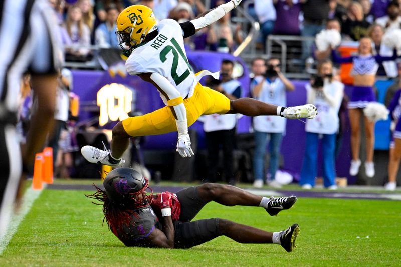 Nov 18, 2023; Fort Worth, Texas, USA; TCU Horned Frogs wide receiver Savion Williams (3) catches a pass for a first down in front of Baylor Bears cornerback Chateau Reed (21) during the second half at Amon G. Carter Stadium. Mandatory Credit: Jerome Miron-USA TODAY Sports