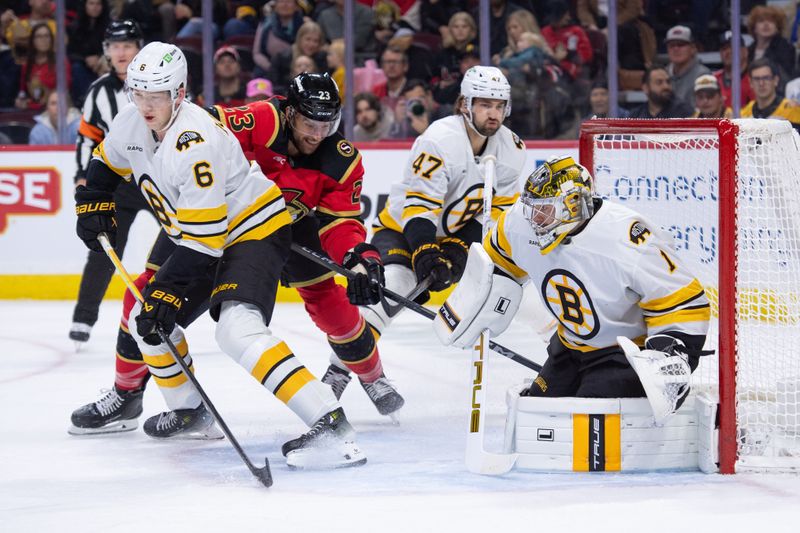 Oct 27, 2025; Ottawa, Ontario, CAN; Ottawa Senators left wing Kurtis MacDermid (23) jockeys for position in front of Boston Bruins goalie Jeremy Swayman (1) in the first period at the Canadian Tire Centre. Mandatory Credit: Marc DesRosiers-IMAGN Images