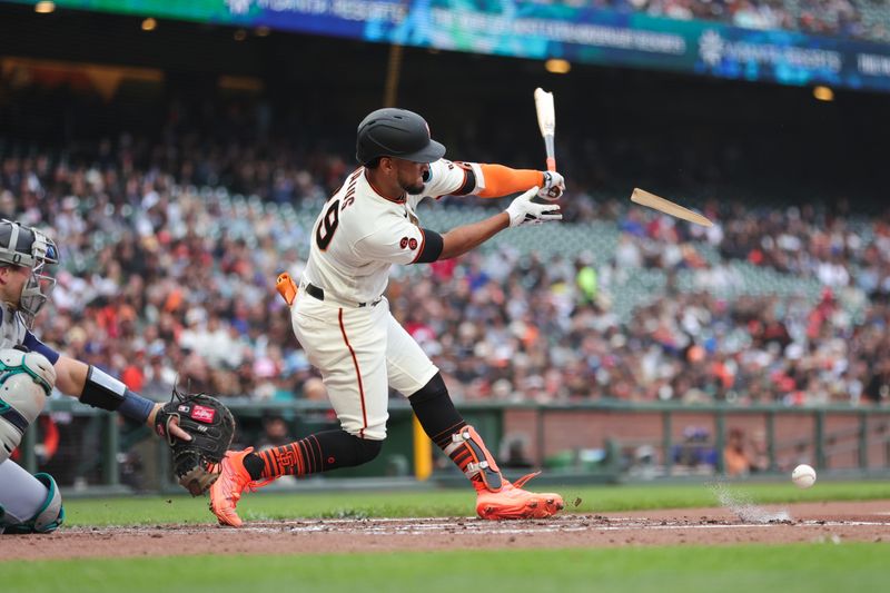 Jul 5, 2023; San Francisco, California, USA; San Francisco Giants outfielder Luis Matos (29) breaks his bat during the second inning against the Seattle Mariners at Oracle Park. Mandatory Credit: Sergio Estrada-USA TODAY Sports