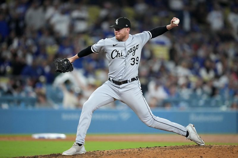 Jun 15, 2023; Los Angeles, California, USA; Chicago White Sox relief pitcher Aaron Bummer (39) throws in the 10th inning against the Los Angeles Dodgersat Dodger Stadium. Mandatory Credit: Kirby Lee-USA TODAY Sports