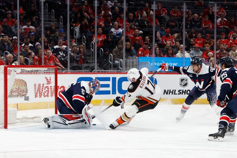 Jan 16, 2024; Washington, District of Columbia, USA; Anaheim Ducks left wing Alex Killorn (17) skates in on Washington Capitals goaltender Darcy Kuemper (35) as Capitals center Evgeny Kuznetsov (92) defends in the second period at Capital One Arena. Mandatory Credit: Geoff Burke-USA TODAY Sports