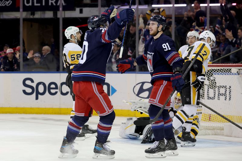 Dec 6, 2024; New York, New York, USA; New York Rangers right wing Reilly Smith (91) celebrates his goal against Pittsburgh Penguins goaltender Alex Nedeljkovic (39) with left wing Chris Kreider (20) during the third period at Madison Square Garden. Mandatory Credit: Brad Penner-Imagn Images