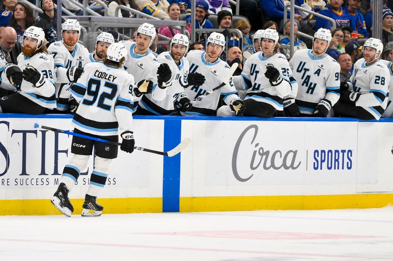 Oct 23, 2025; St. Louis, Missouri, USA; Utah Mammoth center Logan Cooley (92) is congratulated by teammates after scoring against the St. Louis Blues during the first period at Enterprise Center. Mandatory Credit: Jeff Curry-Imagn Images