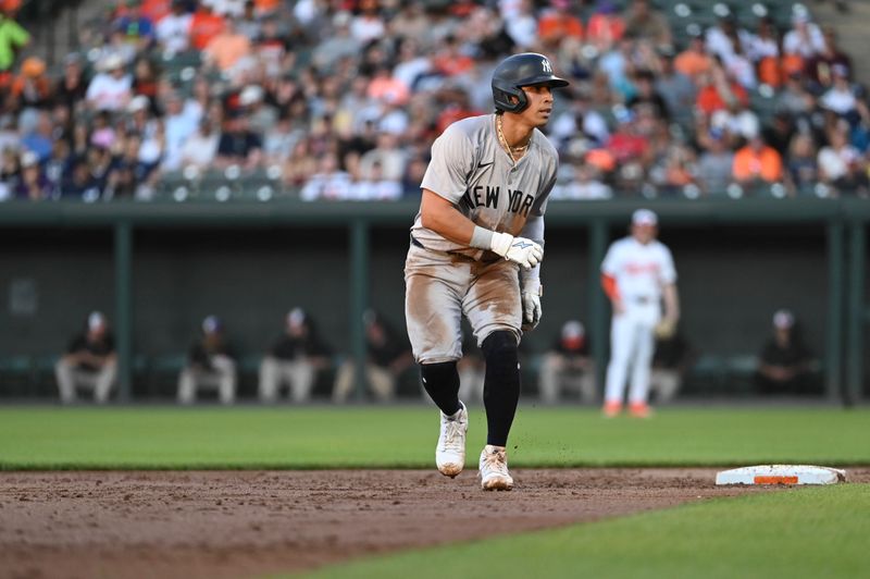 May 1, 2024; Baltimore, Maryland, USA;  New York Yankees third baseman Oswaldo Cabrera (95) leads off second base during the third inning against the Baltimore Orioles at Oriole Park at Camden Yards. Mandatory Credit: Tommy Gilligan-USA TODAY Sports