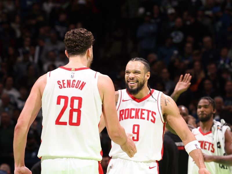 MINNEAPOLIS, MN -  NOVEMBER 26: Dillon Brooks #9 and Alperen Sengun #28 of the Houston Rockets high five during the game against the Minnesota Timberwolves during the Emirates NBA Cup game on November 26, 2024 at Target Center in Minneapolis, Minnesota. NOTE TO USER: User expressly acknowledges and agrees that, by downloading and or using this Photograph, user is consenting to the terms and conditions of the Getty Images License Agreement. Mandatory Copyright Notice: Copyright 2024 NBAE (Photo by David Sherman/NBAE via Getty Images)