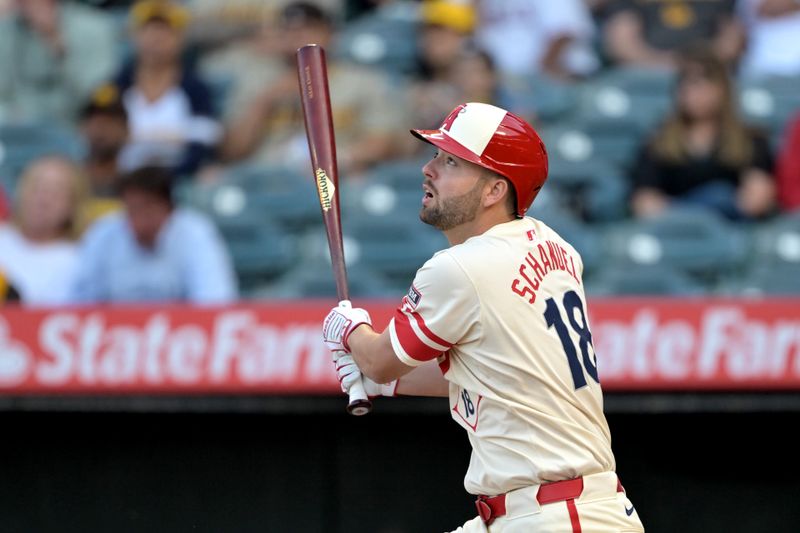 Jun 5, 2024; Anaheim, California, USA;  Los Angeles Angels first baseman Nolan Schanuel (18) hits a lead off solo home run in the first inning against the San Diego Padres at Angel Stadium. Mandatory Credit: Jayne Kamin-Oncea-USA TODAY Sports