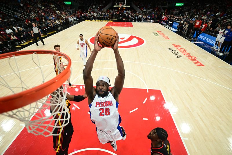 ATLANTA, GA - FEBRUARY 23: Isaiah Stewart #28 of the Detroit Pistons drives to the basket during the game against the Atlanta Hawks on February 23, 2025 at State Farm Arena in Atlanta, Georgia.  NOTE TO USER: User expressly acknowledges and agrees that, by downloading and/or using this Photograph, user is consenting to the terms and conditions of the Getty Images License Agreement. Mandatory Copyright Notice: Copyright 2025 NBAE (Photo by Adam Hagy/NBAE via Getty Images)