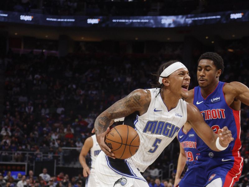 DETROIT, MI - FEBRUARY 24:  Paolo Banchero #5 of the Orlando Magic goes to the basket during the game on February 24, 2024 at Little Caesars Arena in Detroit, Michigan. NOTE TO USER: User expressly acknowledges and agrees that, by downloading and/or using this photograph, User is consenting to the terms and conditions of the Getty Images License Agreement. Mandatory Copyright Notice: Copyright 2024 NBAE (Photo by Brian Sevald/NBAE via Getty Images)