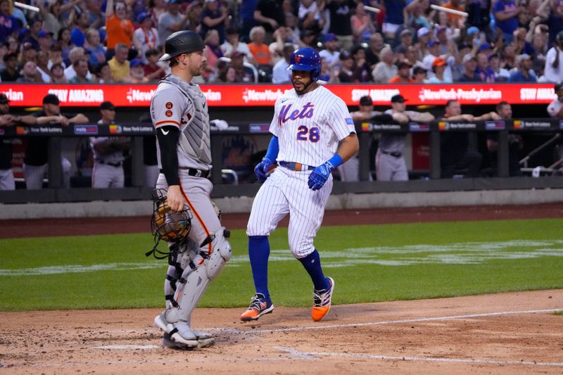 Jul 2, 2023; New York City, New York, USA;  New York Mets left fielder Tommy Pham (28) scores a run on New York Mets second baseman Jeff McNeil (not pictured) RBI infield single against the San Francisco Gianes during the third inning at Citi Field. Mandatory Credit: Gregory Fisher-USA TODAY Sports