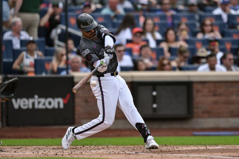 Jun 29, 2024; New York City, New York, USA; New York Mets third baseman Mark Vientos (27) hits a single against the Houston Astros during the second inning at Citi Field. Mandatory Credit: John Jones-USA TODAY Sports