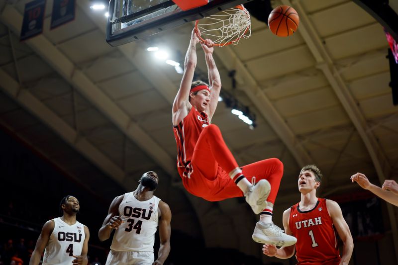 Jan 26, 2023; Corvallis, Oregon, USA; Utah Utes center Branden Carlson (35) dunks the ball past Oregon State Beavers forward Rodrigue Angela (34) during the second half at Gill Coliseum. Mandatory Credit: Soobum Im-USA TODAY Sports