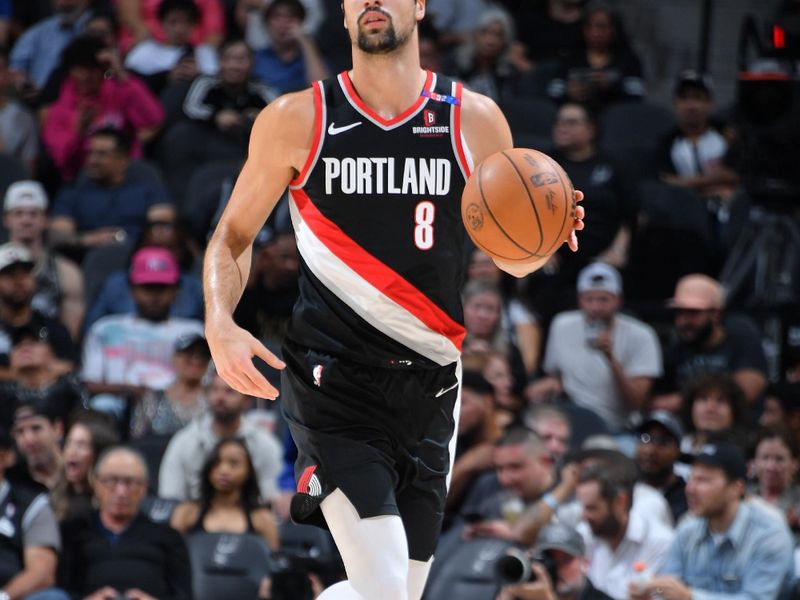 SAN ANTONIO, TX - NOVEMBER 7: Deni Avdija #8 of the Portland Trail Blazers dribbles the ball during the game against the San Antonio Spurs on November 7, 2024 at the Frost Bank Center in San Antonio, Texas. NOTE TO USER: User expressly acknowledges and agrees that, by downloading and or using this photograph, user is consenting to the terms and conditions of the Getty Images License Agreement. Mandatory Copyright Notice: Copyright 2024 NBAE (Photos by Michael Gonzales/NBAE via Getty Images)