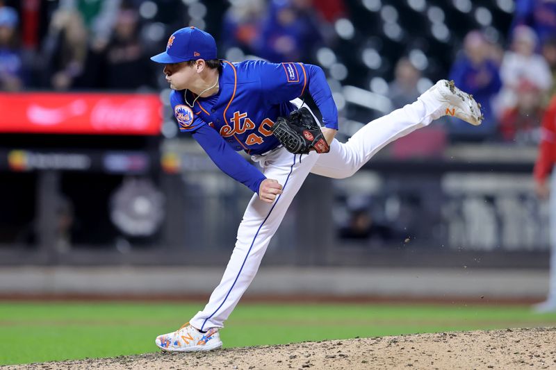 Sep 30, 2023; New York City, New York, USA; New York Mets relief pitcher Drew Smith (40) follows through on a pitch against the Philadelphia Phillies during the ninth inning at Citi Field. Mandatory Credit: Brad Penner-USA TODAY Sports