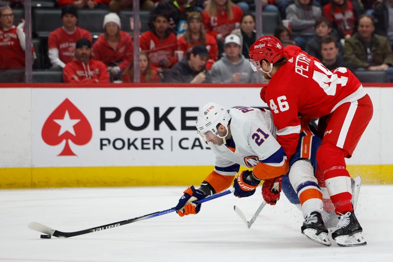 Feb 29, 2024; Detroit, Michigan, USA;  New York Islanders center Brock Nelson (29) skates with the puck against Detroit Red Wings defenseman Jeff Petry (46) in the first period at Little Caesars Arena. Mandatory Credit: Rick Osentoski-USA TODAY Sports