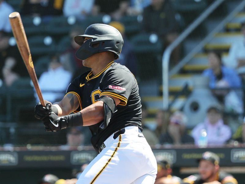 Mar 11, 2025; Bradenton, Florida, USA; Pittsburgh Pirates second base Nick Gonzales (39) hits a 2- RBI double during the fourth inning against the New York Yankees  at LECOM Park. Mandatory Credit: Kim Klement Neitzel-Imagn Images