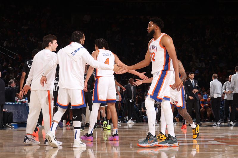 NEW YORK, NY - NOVEMBER 17: Jalen Brunson #11 and Karl-Anthony Towns #32 of the New York Knicks high five during the game against the Brooklyn Nets on November 17, 2024 at Madison Square Garden in New York City, New York.  NOTE TO USER: User expressly acknowledges and agrees that, by downloading and or using this photograph, User is consenting to the terms and conditions of the Getty Images License Agreement. Mandatory Copyright Notice: Copyright 2024 NBAE  (Photo by Nathaniel S. Butler/NBAE via Getty Images)