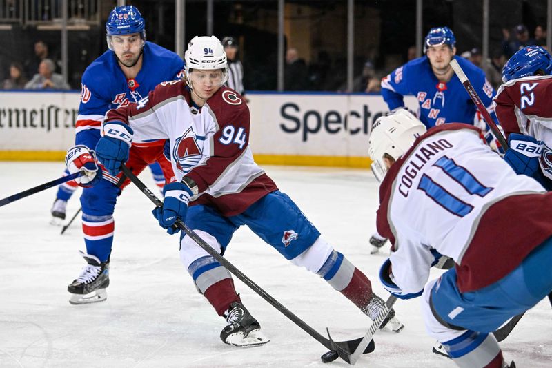 Feb 5, 2024; New York, New York, USA;  Colorado Avalanche left wing Joel Kiviranta (94) plays the puck against the New York Rangers during the second period at Madison Square Garden. Mandatory Credit: Dennis Schneidler-USA TODAY Sports