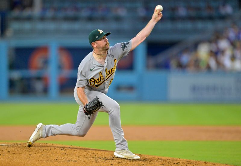 Aug 2, 2023; Los Angeles, California, USA;  Oakland Athletics relief pitcher Hogan Harris (63) throws to the plate in the third inning against the Los Angeles Dodgers at Dodger Stadium. Mandatory Credit: Jayne Kamin-Oncea-USA TODAY Sports