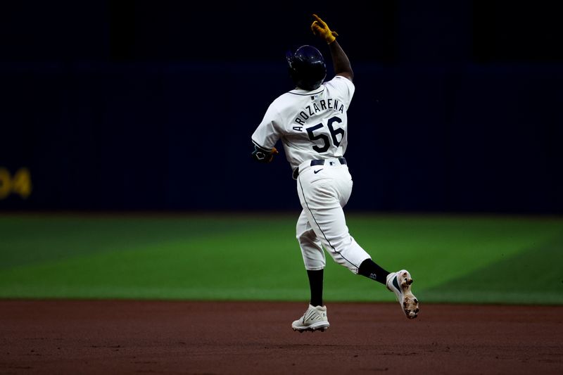 Jul 11, 2024; St. Petersburg, Florida, USA; Tampa Bay Rays outfielder Randy Arozarena (56) runs the bases after hitting a two-run home run against the New York Yankees in the first inning at Tropicana Field. Mandatory Credit: Nathan Ray Seebeck-USA TODAY Sports