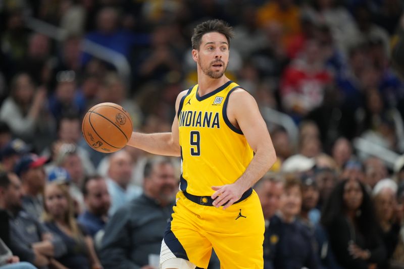 INDIANAPOLIS, IN - NOVEMBER 10: T.J. McConnell #9 of the Indiana Pacers dribbles the ball during the game against the New York Knicks on November 10, 2024 at Gainbridge Fieldhouse in Indianapolis, Indiana. NOTE TO USER: User expressly acknowledges and agrees that, by downloading and or using this Photograph, user is consenting to the terms and conditions of the Getty Images License Agreement. Mandatory Copyright Notice: Copyright 2024 NBAE (Photo by A.J. Mast/NBAE via Getty Images)