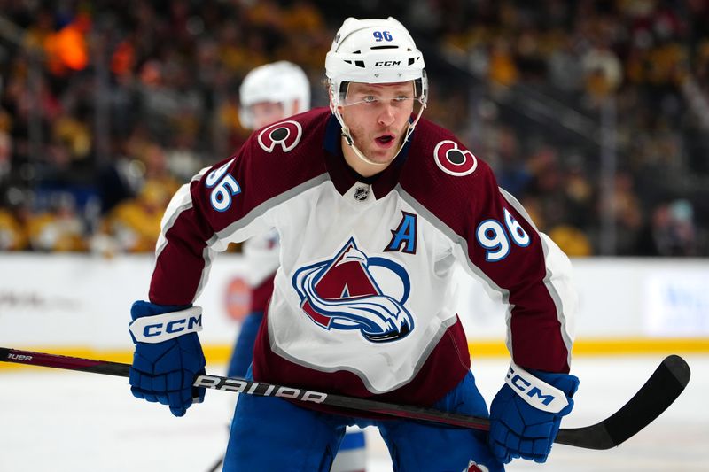 Apr 14, 2024; Las Vegas, Nevada, USA; Colorado Avalanche right wing Mikko Rantanen (96) talks to a team mate before a face off against the Vegas Golden Knights during the second period at T-Mobile Arena. Mandatory Credit: Stephen R. Sylvanie-USA TODAY Sports