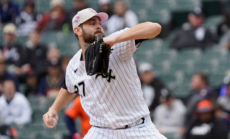 May 14, 2023; Chicago, Illinois, USA; Chicago White Sox starting pitcher Lucas Giolito (27) throws the ball against the Houston Astros during the first inning at Guaranteed Rate Field. Mandatory Credit: David Banks-USA TODAY Sports