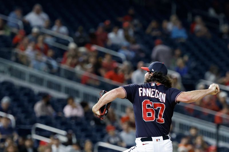 Sep 19, 2023; Washington, District of Columbia, USA; Washington Nationals relief pitcher Kyle Finnegan (67) pitches against the Chicago White Sox during the ninth inning at Nationals Park. Mandatory Credit: Geoff Burke-USA TODAY Sports