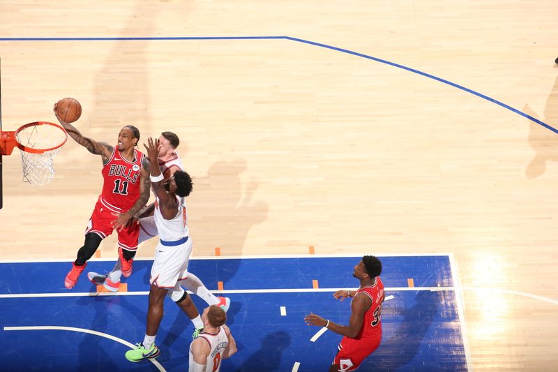 NEW YORK, NY - JANUARY 3: DeMar DeRozan #11 of the Chicago Bulls drives to the basket during the game against the New York Knicks on January 3, 2024 at Madison Square Garden in New York City, New York.  NOTE TO USER: User expressly acknowledges and agrees that, by downloading and or using this photograph, User is consenting to the terms and conditions of the Getty Images License Agreement. Mandatory Copyright Notice: Copyright 2024 NBAE  (Photo by Nathaniel S. Butler/NBAE via Getty Images)