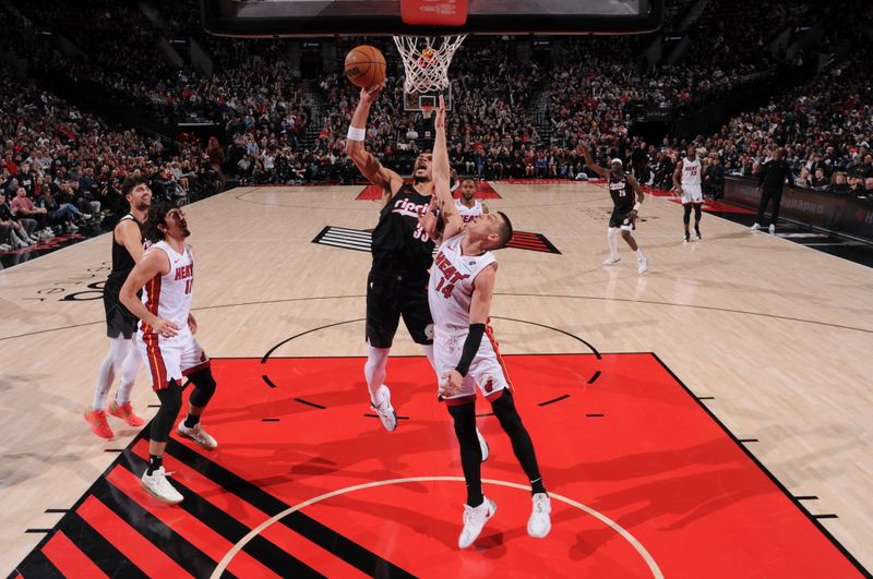 PORTLAND, OR - JANUARY 11: Toumani Camara #33 of the Portland Trail Blazers shoots the ball during the game against the Miami Heat on January 11, 2025 at the Moda Center Arena in Portland, Oregon. NOTE TO USER: User expressly acknowledges and agrees that, by downloading and or using this photograph, user is consenting to the terms and conditions of the Getty Images License Agreement. Mandatory Copyright Notice: Copyright 2025 NBAE (Photo by Cameron Browne/NBAE via Getty Images)