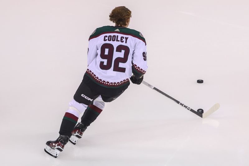 Oct 13, 2023; Newark, New Jersey, USA; Arizona Coyotes center Logan Cooley (92) takes his rookie lap before the start of his first NHL game against the New Jersey Devils at Prudential Center. Mandatory Credit: Ed Mulholland-USA TODAY Sports