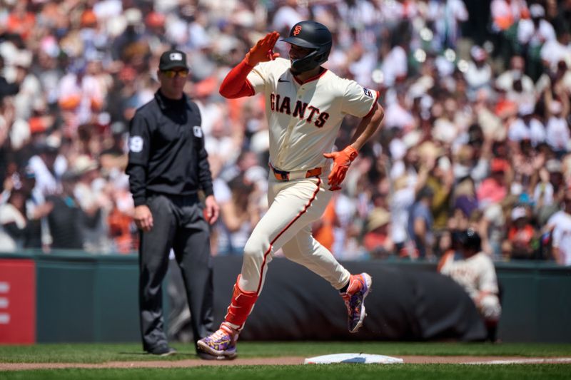 May 4, 2025; San Francisco, California, USA; San Francisco Giants shortstop Willy Adames (2) runs toward home plate after hitting his second home run of the game against the Colorado Rockies during the second inning at Oracle Park. Mandatory Credit: Robert Edwards-Imagn Images