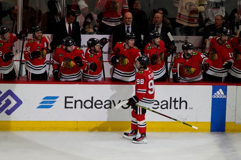 Feb 17, 2024; Chicago, Illinois, USA; Chicago Blackhawks center Connor Bedard (98) celebrates his goal against the Ottawa Senators during the second period at United Center. Mandatory Credit: David Banks-USA TODAY Sports