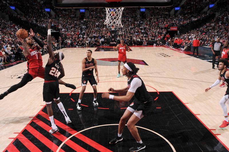 PORTLAND, OR - APRIL 12: Cam Whitmore #7 of the Houston Rockets drives to the basket during the game against the Portland Trail Blazers on April 12, 2024 at the Moda Center Arena in Portland, Oregon. NOTE TO USER: User expressly acknowledges and agrees that, by downloading and or using this photograph, user is consenting to the terms and conditions of the Getty Images License Agreement. Mandatory Copyright Notice: Copyright 2024 NBAE (Photo by Cameron Browne/NBAE via Getty Images)