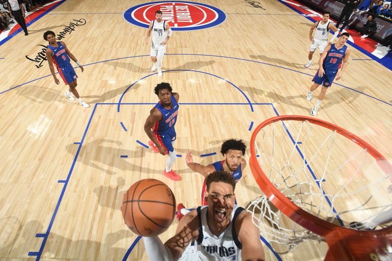 DETROIT, MI - MARCH 9: Dwight Powell #7 of the Dallas Mavericks drives to the basket during the game against the Detroit Pistons on March 9, 2024 at Little Caesars Arena in Detroit, Michigan. NOTE TO USER: User expressly acknowledges and agrees that, by downloading and/or using this photograph, User is consenting to the terms and conditions of the Getty Images License Agreement. Mandatory Copyright Notice: Copyright 2024 NBAE (Photo by Chris Schwegler/NBAE via Getty Images)