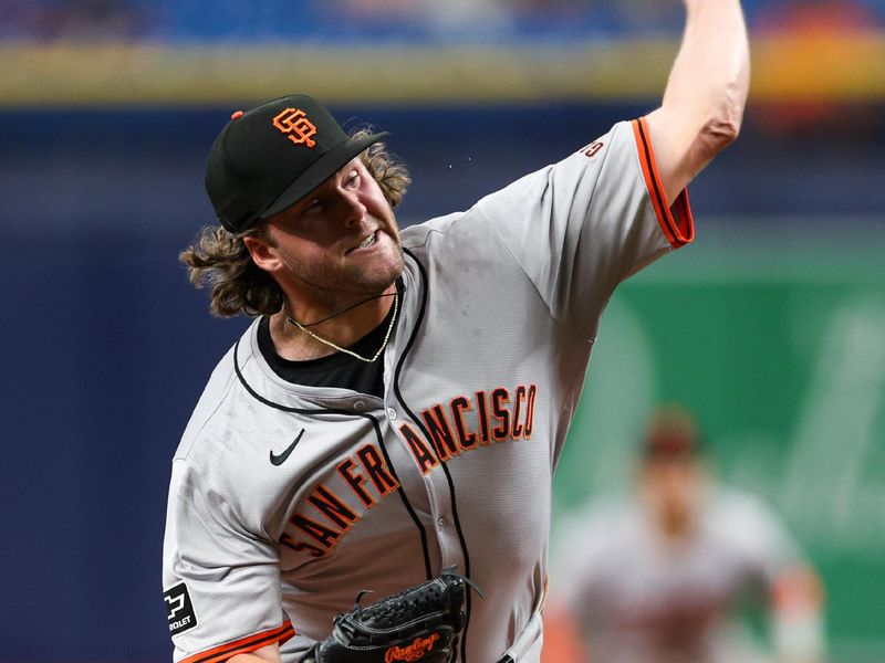 Apr 13, 2024; St. Petersburg, Florida, USA;  San Francisco Giants pitcher Erik Miller (68) throws a pitch against the Tampa Bay Rays in the ninth inning at Tropicana Field. Mandatory Credit: Nathan Ray Seebeck-USA TODAY Sports