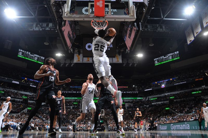 SAN ANTONIO, TX - APRIL 14: Sidy Cissoko #25 of the San Antonio Spurs drives to the basket during the game  against the Detroit Pistons on April 14, 2024 at the Frost Bank Center in San Antonio, Texas. NOTE TO USER: User expressly acknowledges and agrees that, by downloading and or using this photograph, user is consenting to the terms and conditions of the Getty Images License Agreement. Mandatory Copyright Notice: Copyright 2024 NBAE (Photos by Michael Gonzales/NBAE via Getty Images)